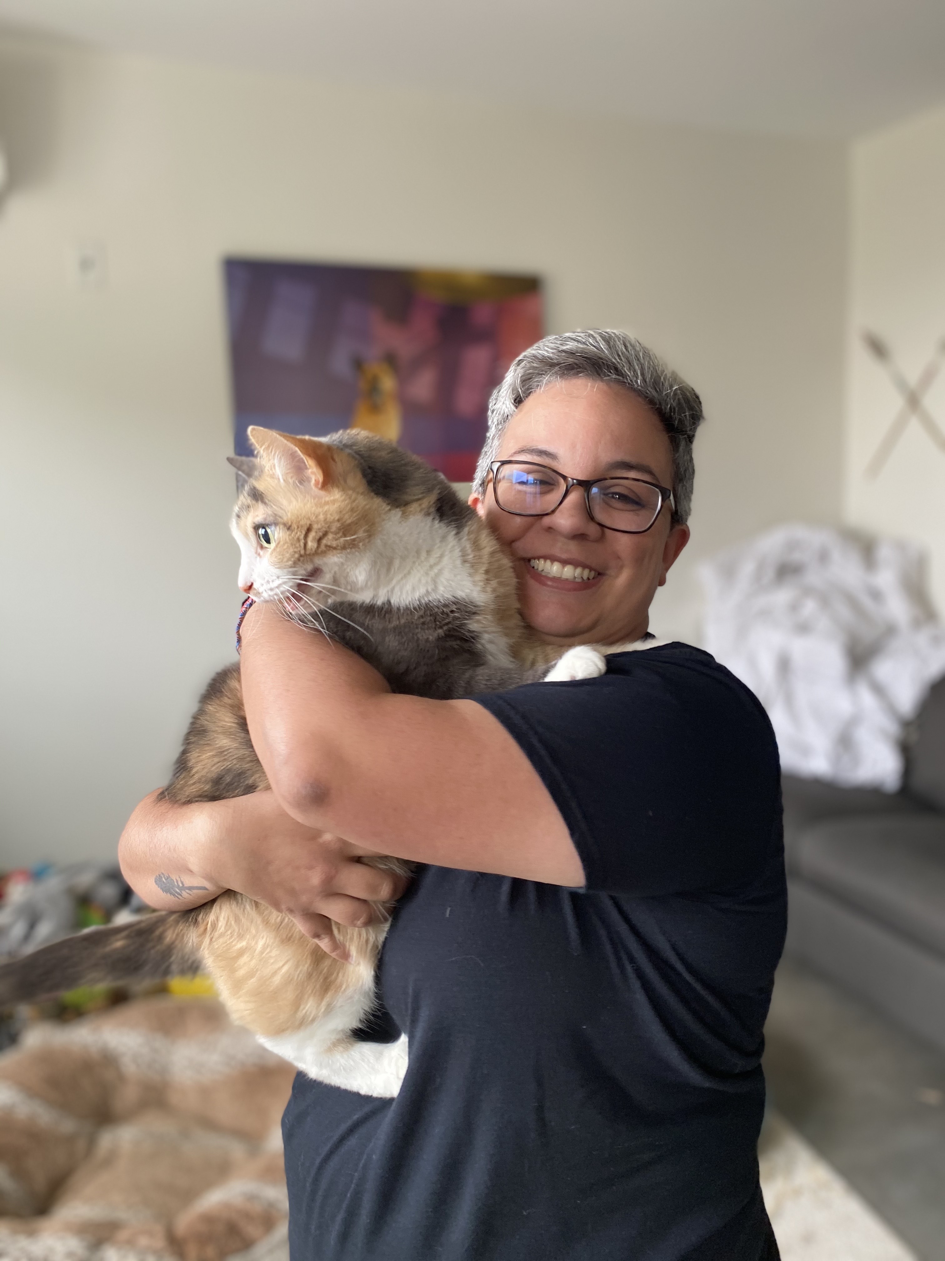person holding cat person holding cat